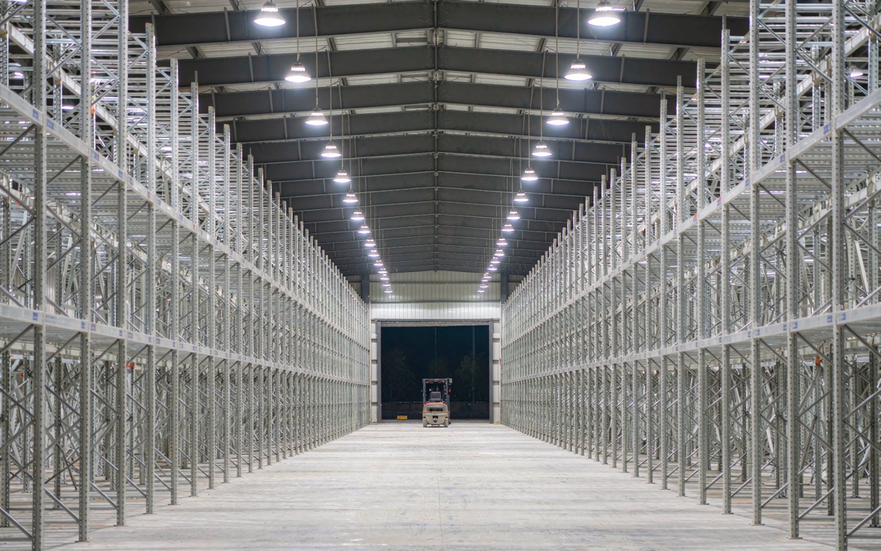 Warehouse racking aisles — SKY STAR LED High Bay Light
